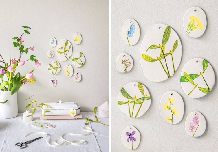 Wandeko mit selbsttrocknendem Ton und Mistel und andere Blumenabdrücke, die bunt nachbemalt wurden