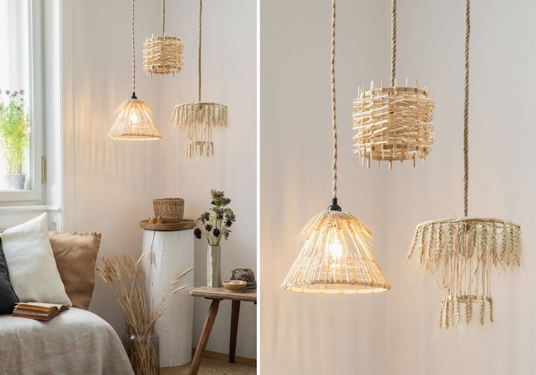 Lampenschirme in unterschiedlicher Länge sind mit Ähren und Stroh designt