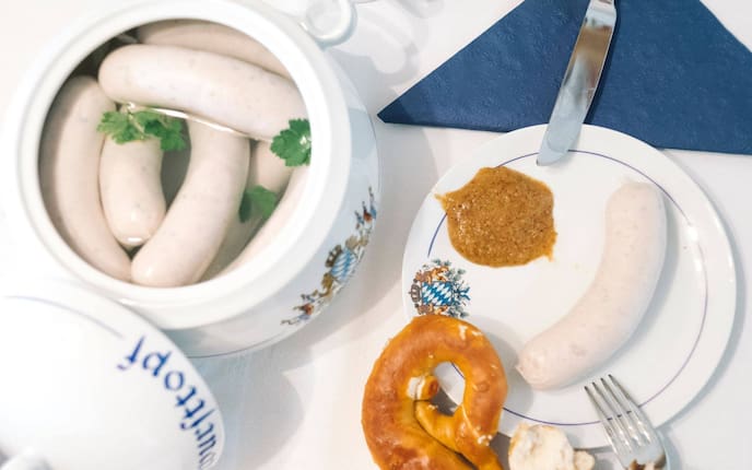 Weißwurst kochen, essen, Beilagen, Geschichte