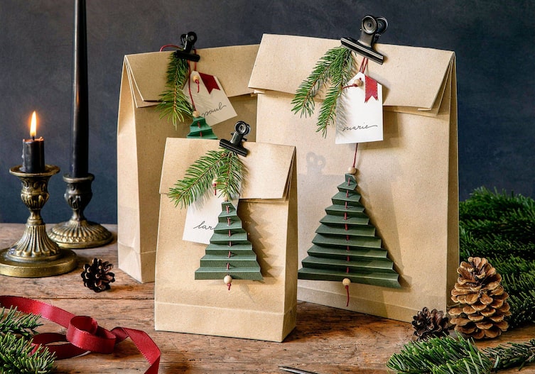 Schlichte Papiersackerl werden zum Blickfang, wenn man sie liebevoll schmückt.