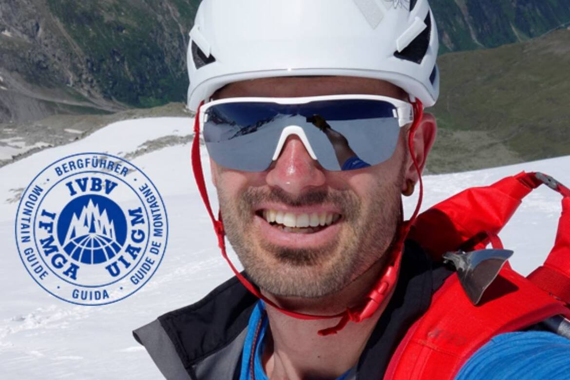 David Pichler, Bergführer & Guide, vor Bergkulisse mit Schnee