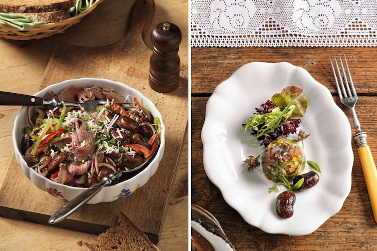 Alt-Text: Zwei steirische Käferbohnen-Gerichte im Vergleich: links Käferbohnensalat mit blättrig geschnittenem Tafelspitz, roten Paprikastreifen, Schnittlauch und frisch geriebenem Kren in einer geblümten Keramikschüssel auf einem Holzbrett; rechts eine elegant angerichtete Käferbohnensulz mit Wurzelgemüse und gemischtem Blattsalat auf weißem Porzellan, garniert mit ganzen Käferbohnen und frischen Kräutern.