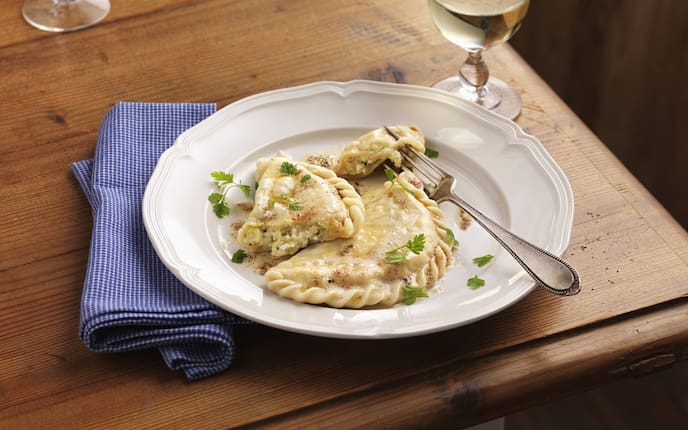 Kärntner Kasnudel, gekrendelt, Teigtaschen, Topfenteigtaschen, Servus Rezept