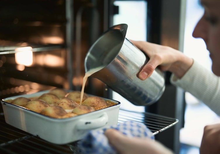 Rezept gebackene Erdäpfelknödel mit Speck Guss