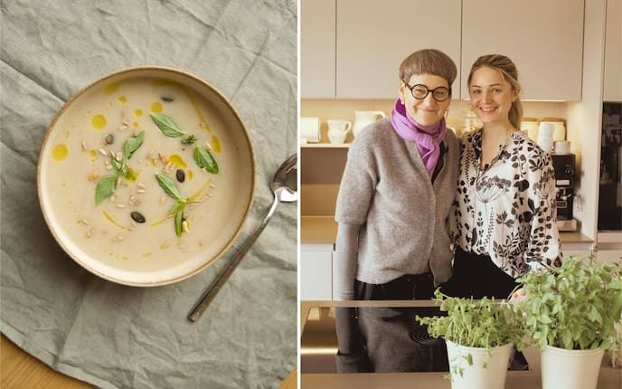 Paula Bründl und Susanne Bernegger-Flintsch von „nana! gesund bleiben" stehen in der Küche. Daneben ist eine Sellercremesuppe mit Topinambur abgeildet.